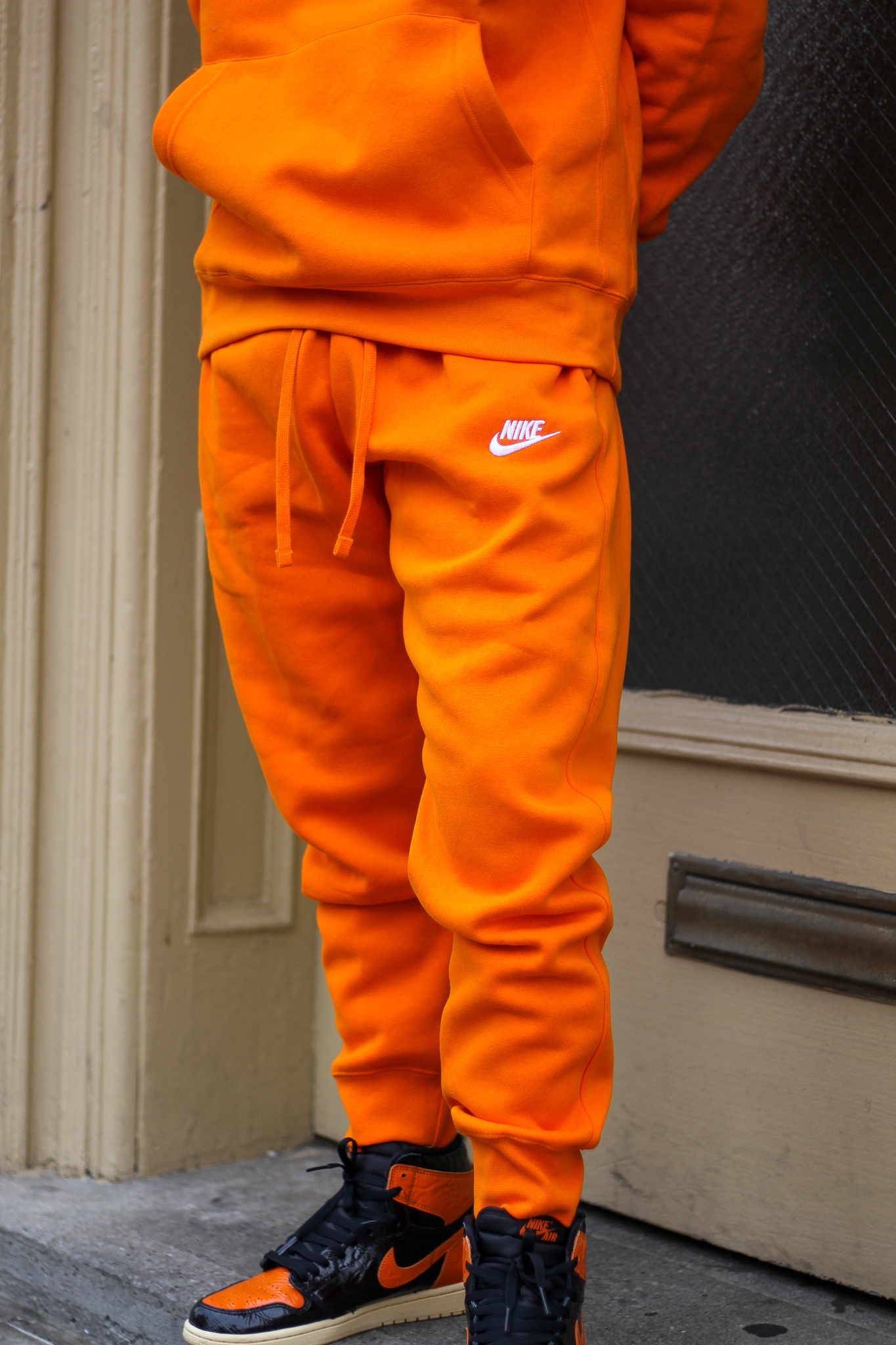 orange nike jumpsuit
