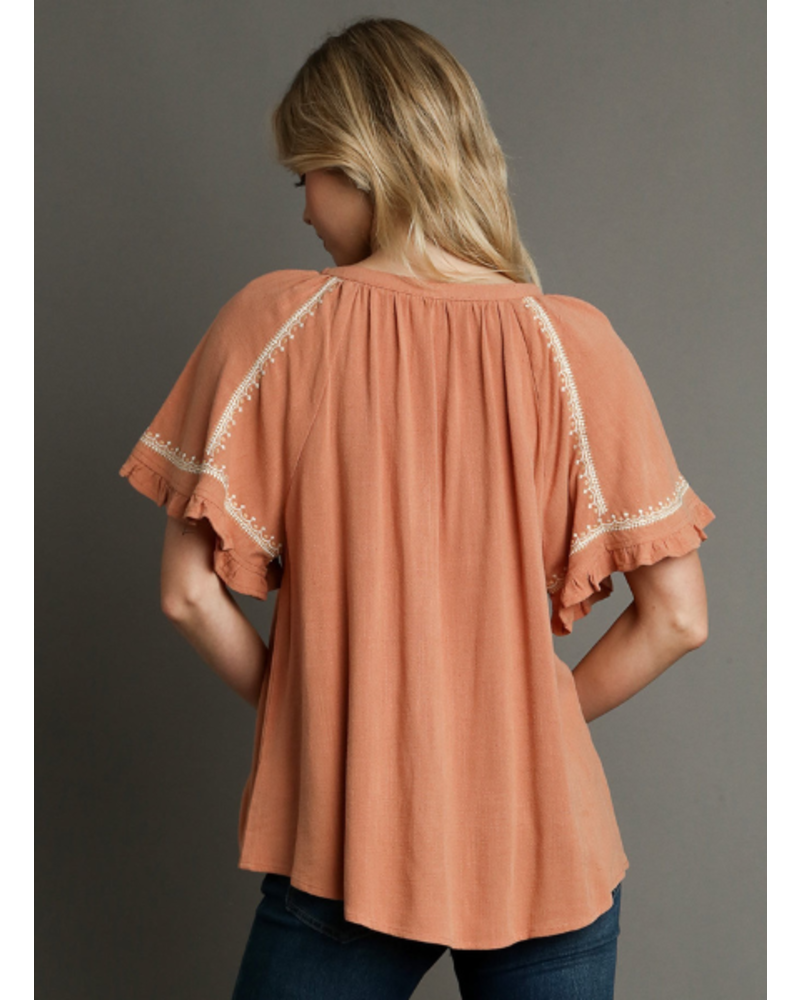 Embroidered Flutter Sleeve Tie Neck Top
