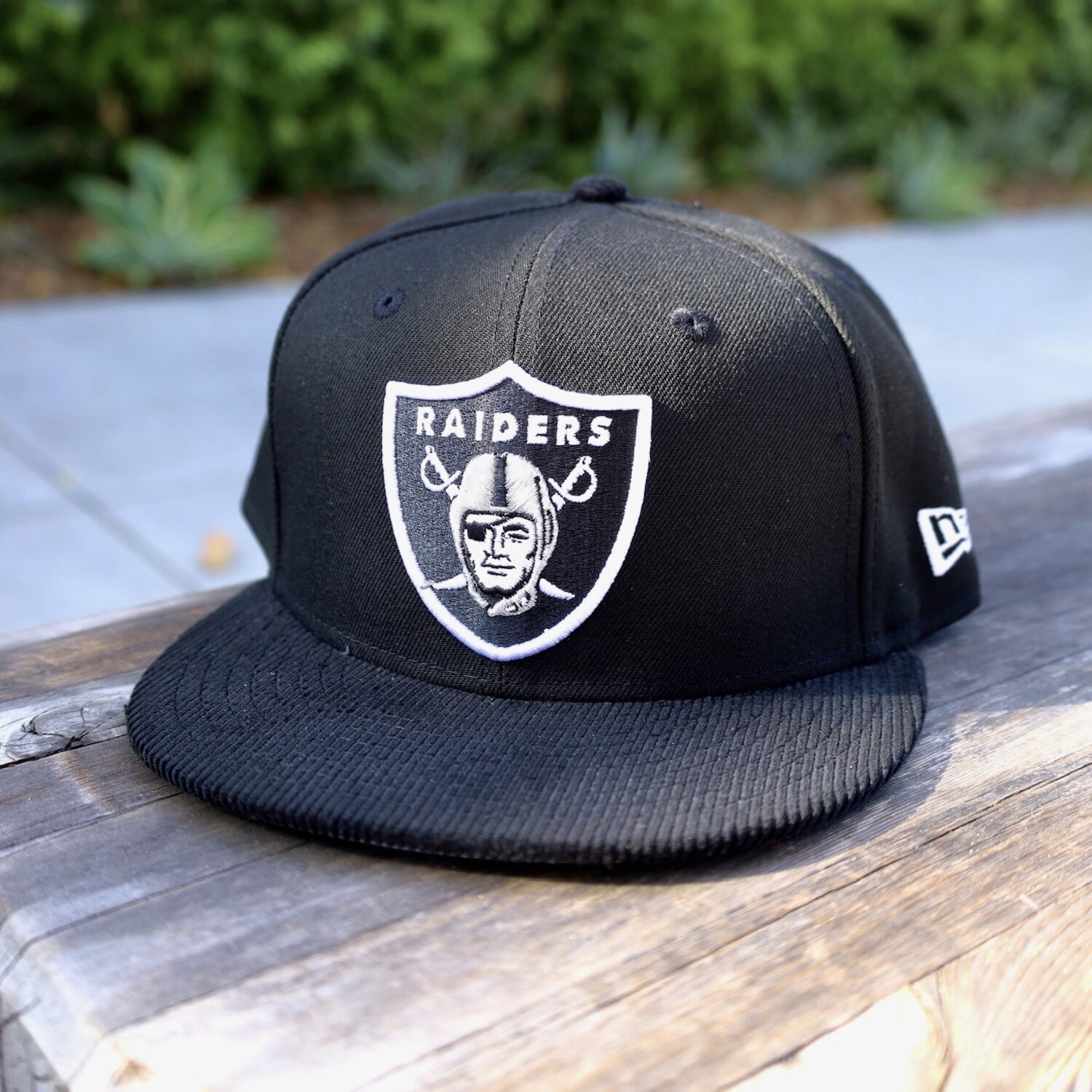 Raiders Shield Black Poly/Cord 950 - The Locker Room of Downey