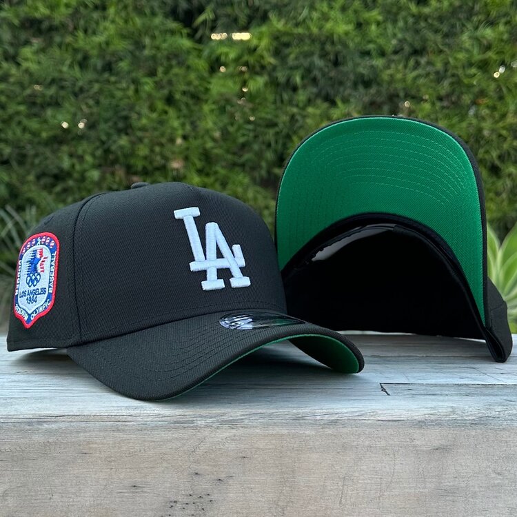 New Era LA Black White 1984 Olympics Patch Green UV 940 A-Frame