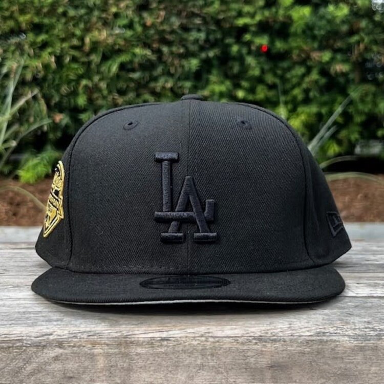 New Era LA Dodgers Black Black Metallic Gold 2025 WS Champs Side Patch 950 Snapback