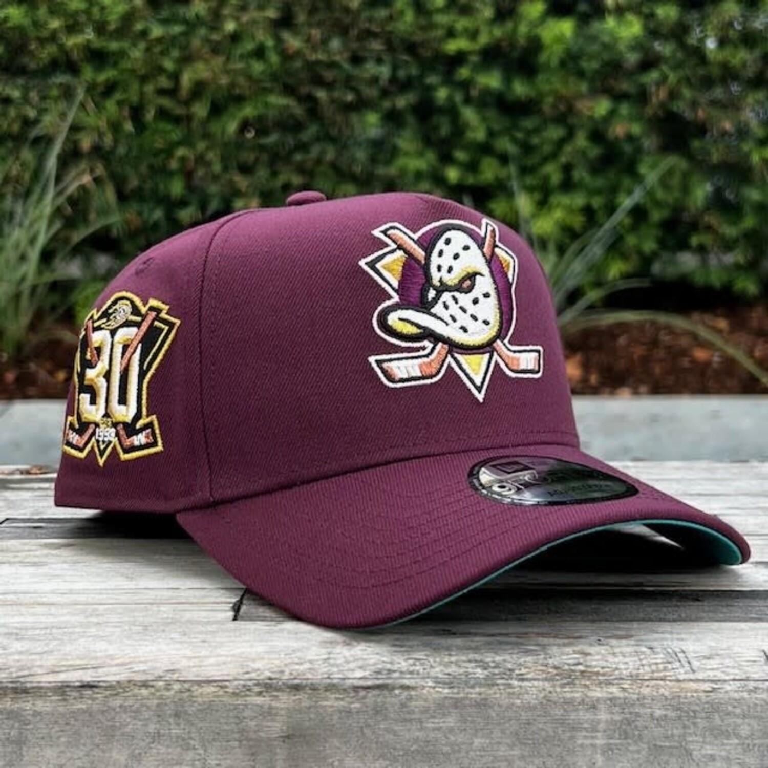 Mighty Ducks Maroon 30th Anniv Teal UV 940 A-Frame - The Locker