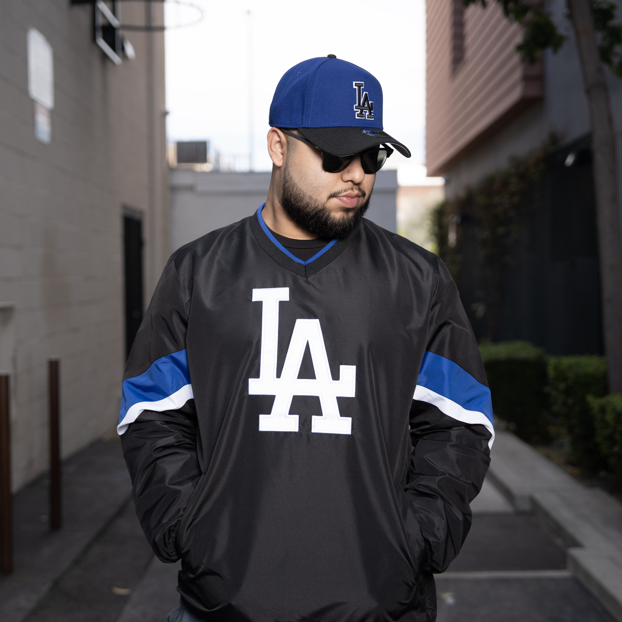 Los Angeles Dodgers アメリカンフットボールジャージ Los Angeles Dodgers Black Half Zip Starter Jacket | Pro Image Sports