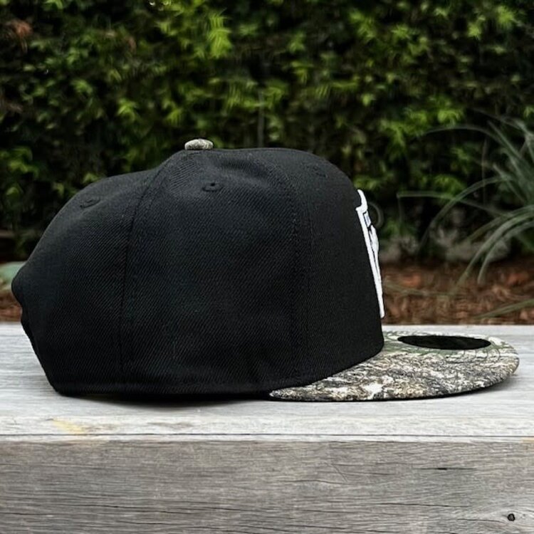 New Era Raiders Black/Real Tree 950 Snapback