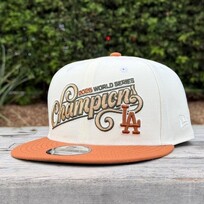 New Era LA Ivory/Light Brown 2025 World Series Champ Script 950