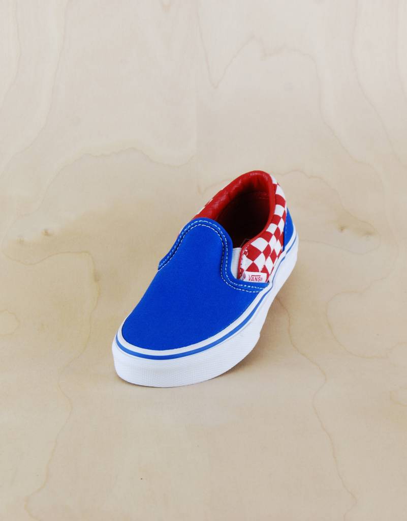 red and blue slip on vans