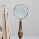 Creative Co-op Brass & Bone Magnifying Glass on Stand