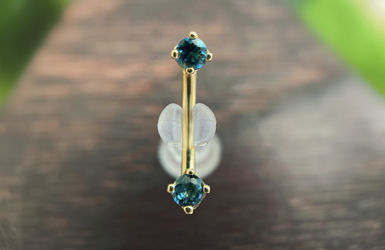 16g 5/16 Curved barbell - Yellow gold - Prong London blue Topaz