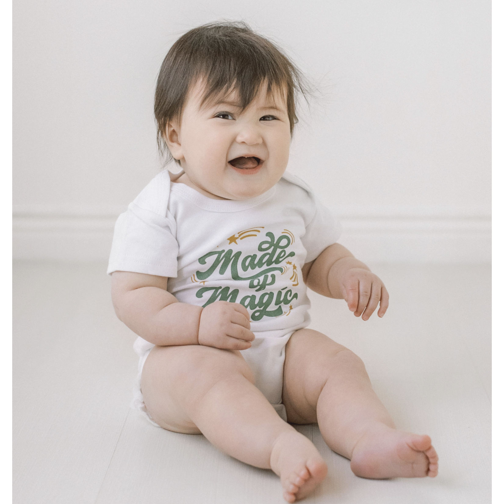 Sweetpea and Co Made of Magic Baby Onesie