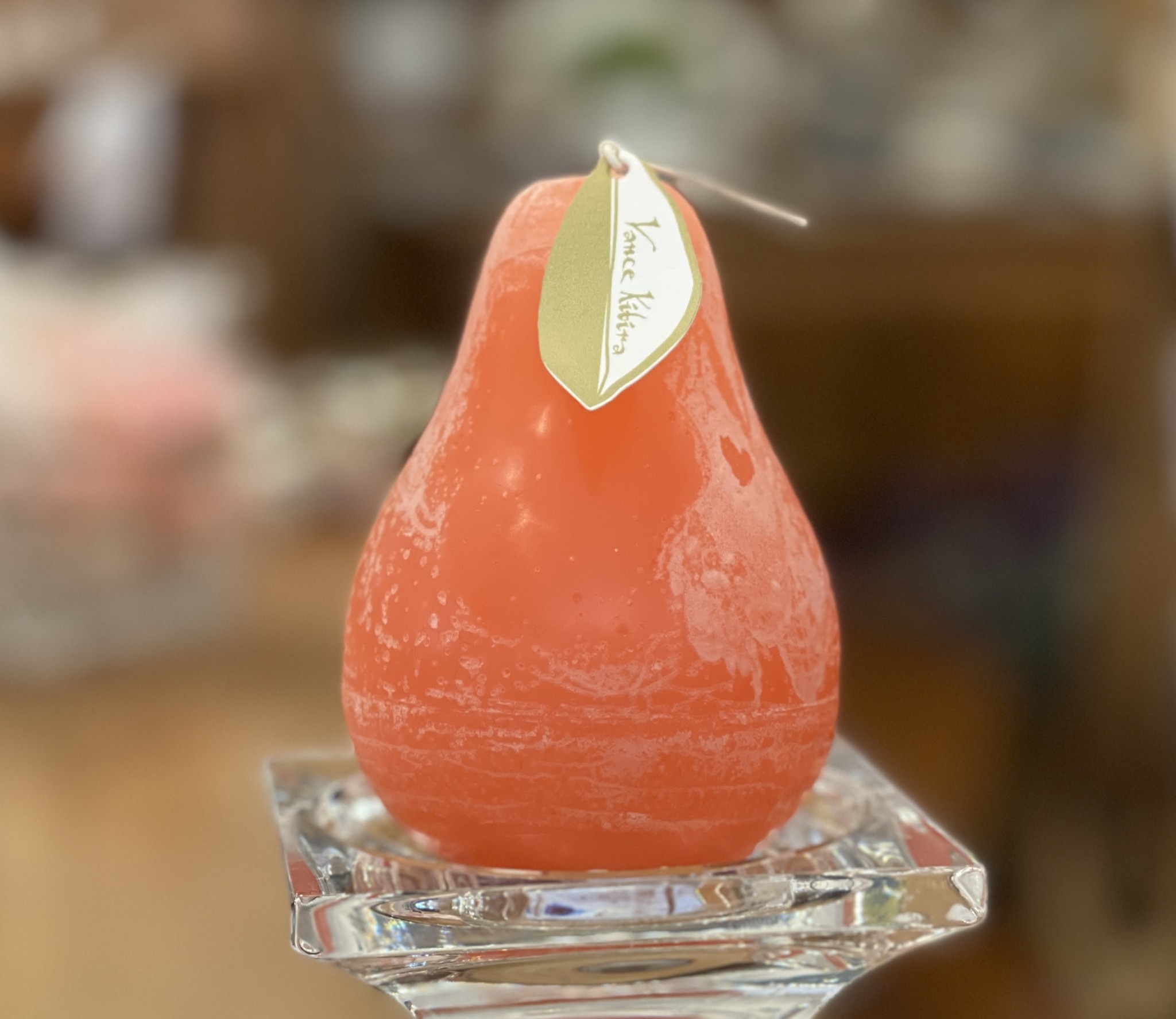 Specacular Vance Kitira Timber Pear Coral Colored Candle. 3 in x 4 in