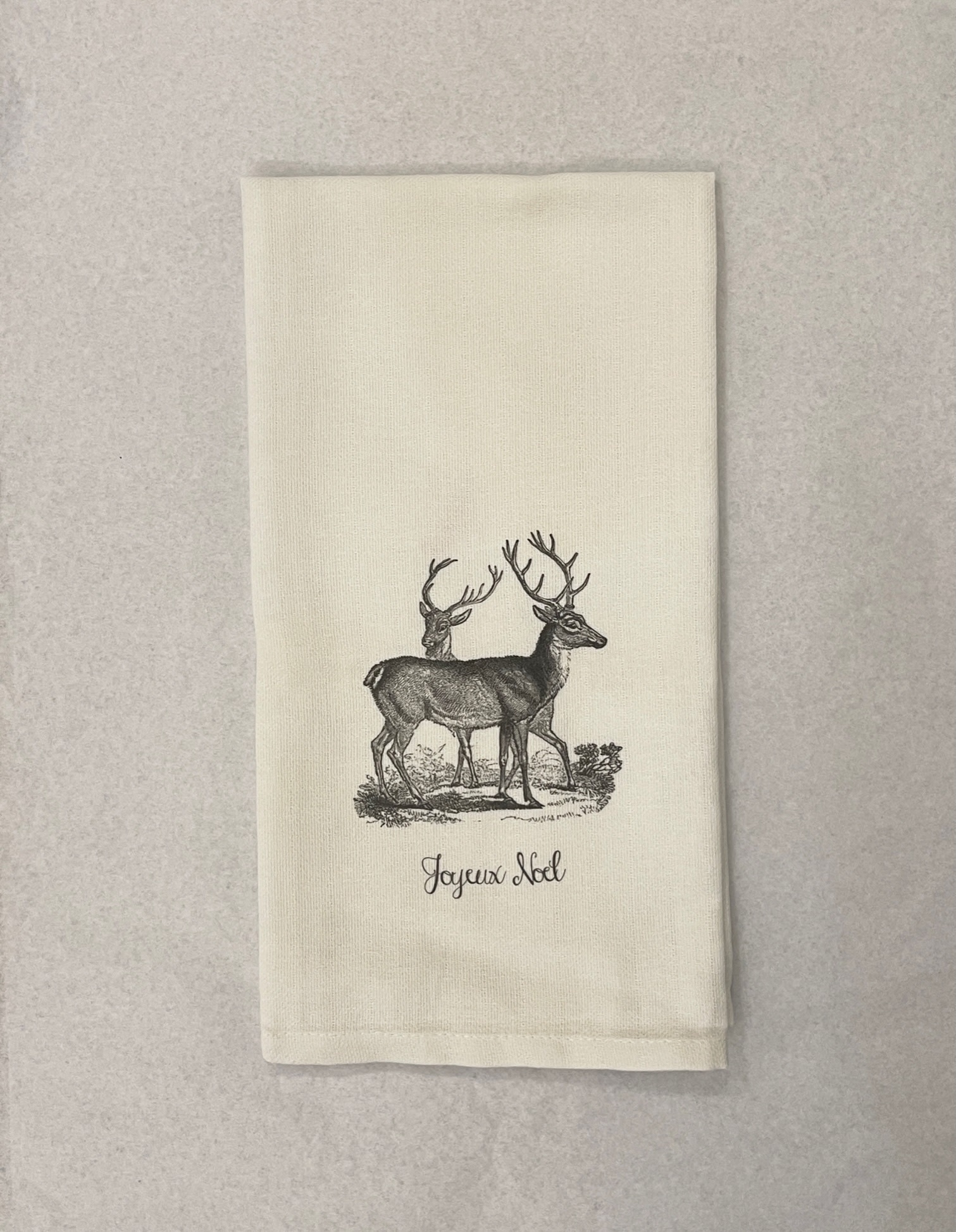 https://cdn.shoplightspeed.com/shops/605666/files/59133740/towel-grey-vintage-deer-joyeux-noel.jpg