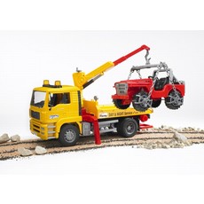 BRUDER TOYS AMERICA MAN TGA TOW TRUCK WITH CROSS COUNTRY VEHICLE BRUDER