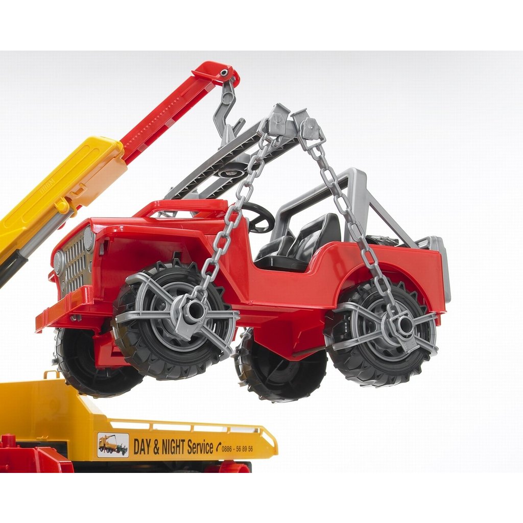 BRUDER TOYS AMERICA MAN TGA TOW TRUCK WITH CROSS COUNTRY VEHICLE BRUDER