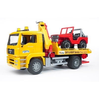 BRUDER TOYS AMERICA MAN TGA TOW TRUCK WITH CROSS COUNTRY VEHICLE BRUDER