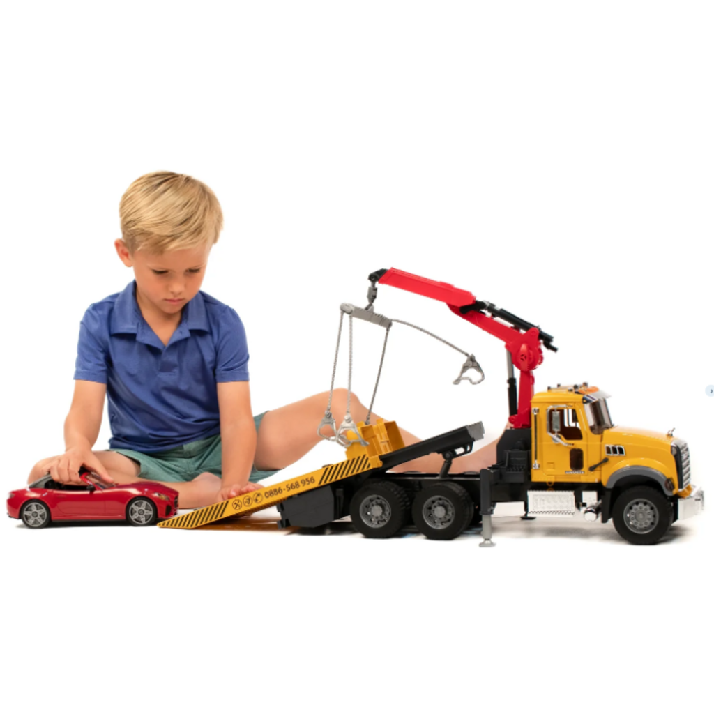 BRUDER TOYS AMERICA MACK GRANITE TOW TRUCK WITH ROADSTER