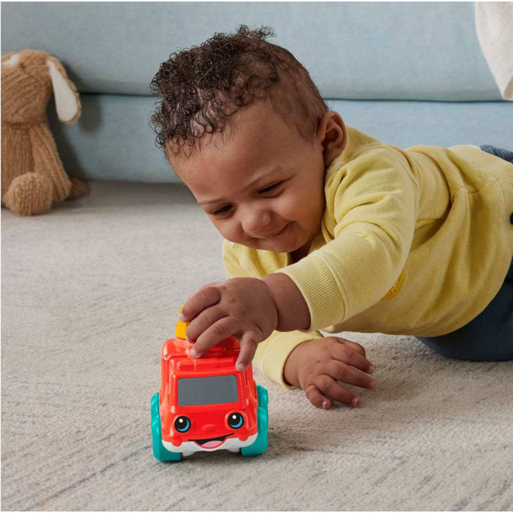 FISHER PRICE CHME & RIDE FIRE TRUCK