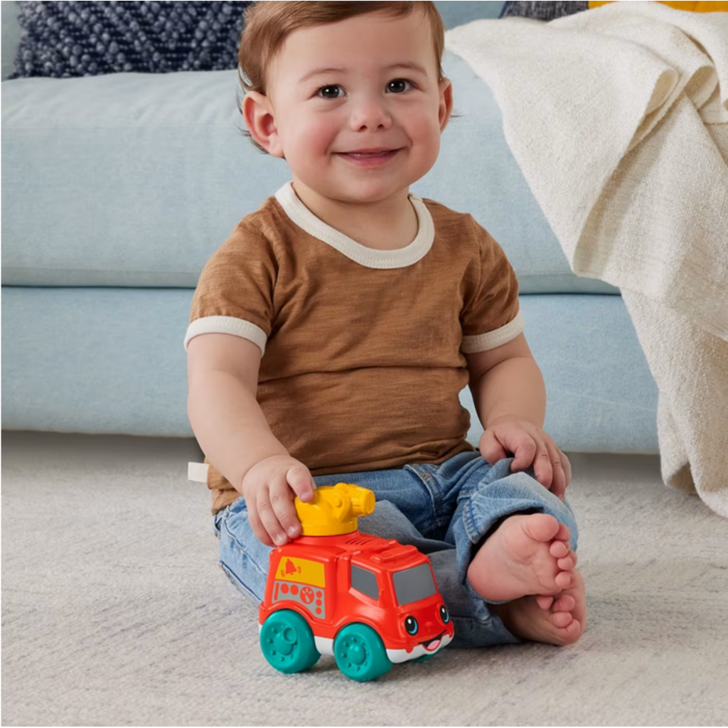 FISHER PRICE CHME & RIDE FIRE TRUCK