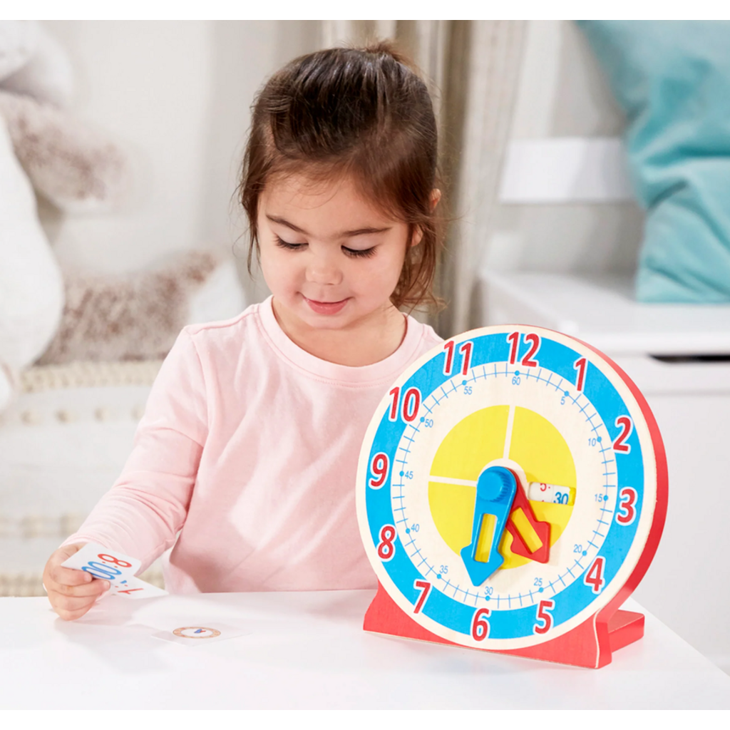 MELISSA AND DOUG TURN & TELL CLOCK