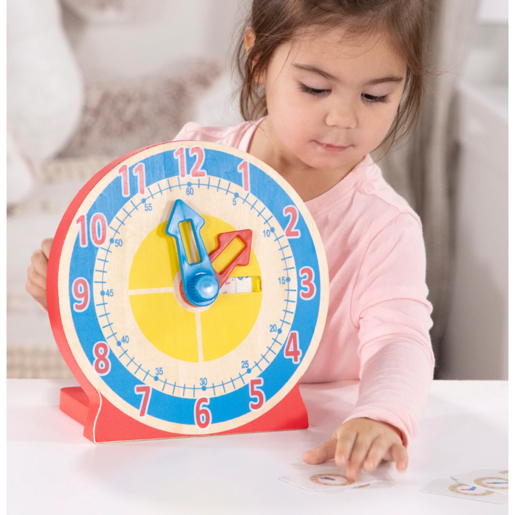 MELISSA AND DOUG TURN & TELL CLOCK