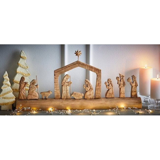 Nativity Scene On Carved Wood Log