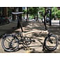 Brompton 2026 Brompton C Line 12spd - Mid - Rack - Dune Sand / Black
