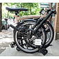 Brompton 2026 Brompton C Line 12spd - Mid - Rack - Dune Sand / Black