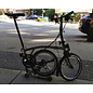 Brompton 2026 Brompton C Line Explore 12spd - Low/Rack - Dune Sand / Black