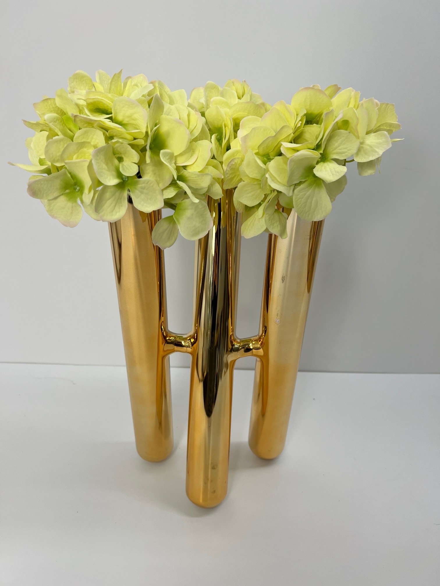 Three Gold Tube Vase with Green Hydrangeas