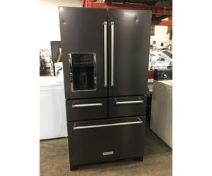 black and stainless steel refrigerator