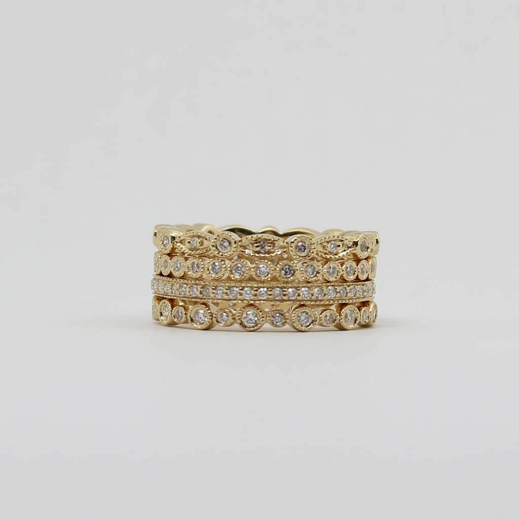 American Jewelry 14k Yellow Gold .83ctw Diamond 4 Ring Stackable Eternity Band Set (Size 8)