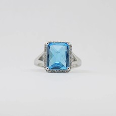 American Jewelry 14k White Gold 4.88ct Emerald Cut Blue Topaz & .20ctw Diamond Halo Ladies Ring (Size 7)