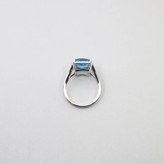 American Jewelry 14k White Gold 4.88ct Emerald Cut Blue Topaz & .20ctw Diamond Halo Ladies Ring (Size 7)