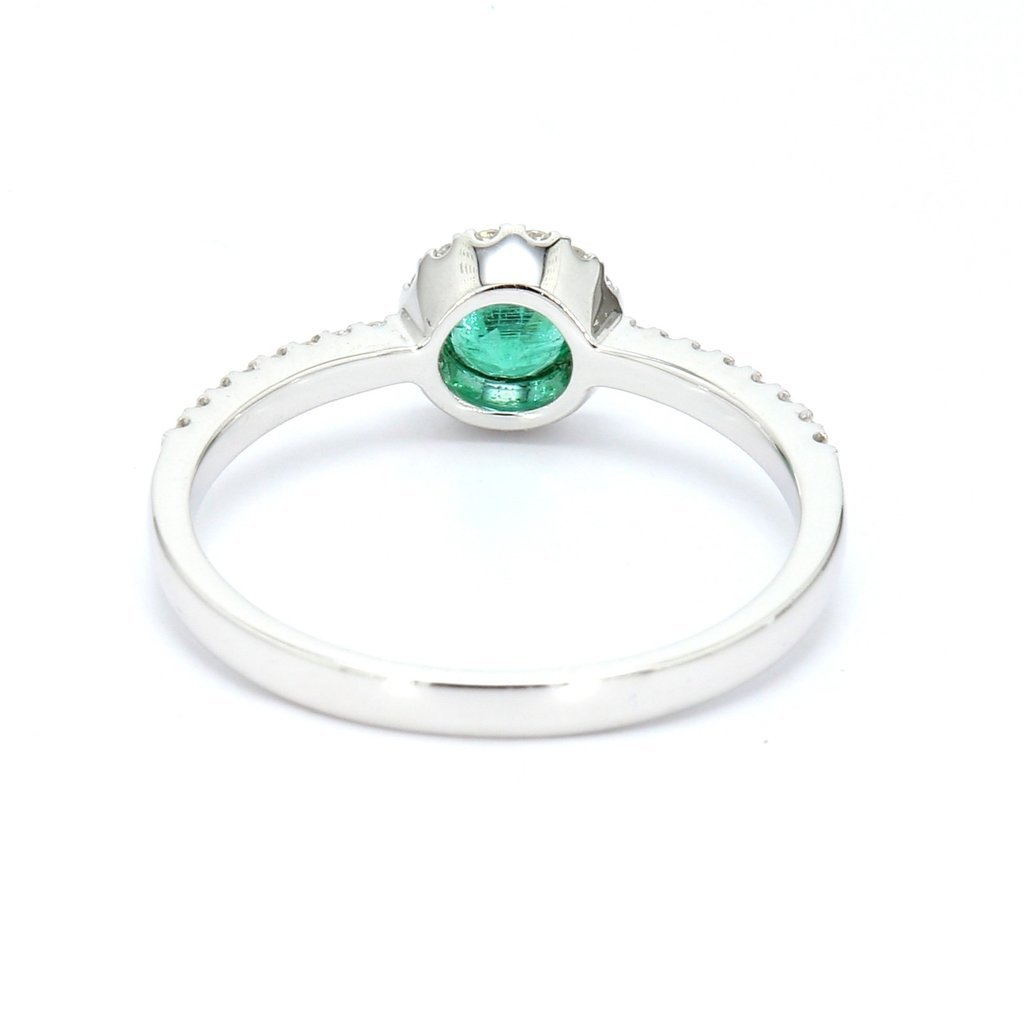 American Jewelry 14K White Gold 0.25ct Emerald & 0.18ctw Diamond Halo Ring (Size 7)