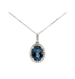 American Jewelry 14k White Gold Oval London Blue Topaz & .20ctw Diamond Halo Pendant