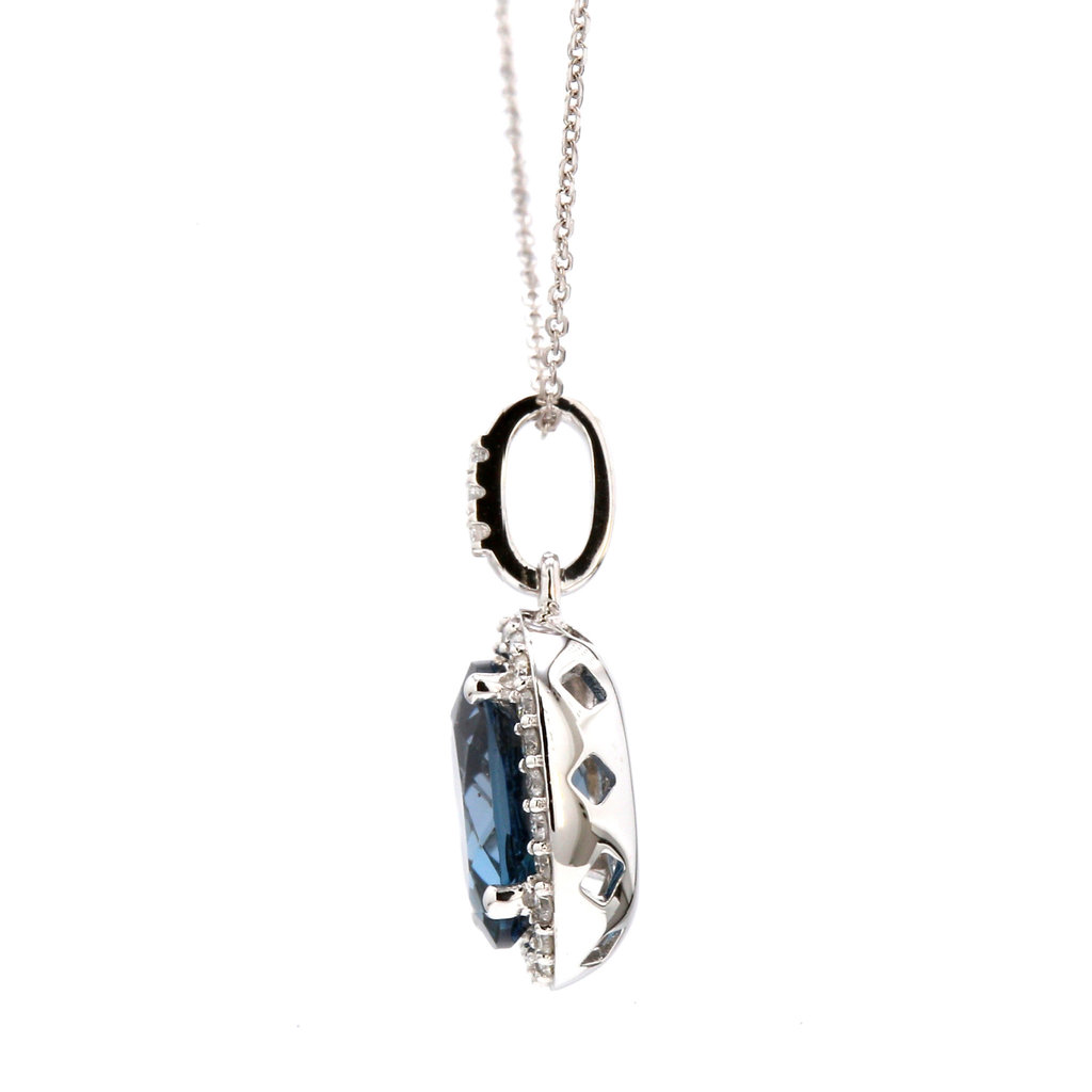 American Jewelry 14k White Gold Oval London Blue Topaz & .20ctw Diamond Halo Pendant