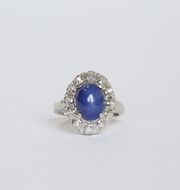 American Jewelry 14K White Gold Vintage Star Sapphire & 1/4ctw Diamond Halo Ring (Size 3)