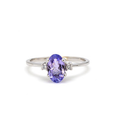 American Jewelry 14k White Gold 1.16ct Oval Tanzanite & .04ctw Diamond Ladies Ring (Size 6.5)