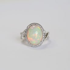American Jewelry 14K White Gold 3.40ct Opal & .43ctw Diamond Halo Ring (Size 7)