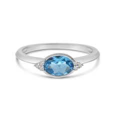 American Jewelry 14k White Gold .78ct Oval Blue Topaz & .04ctw Diamond East to West Ladies Ring (Size 7)