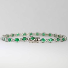 American Jewelry 14k White Gold 3.9ctw Oval Emerald & .23ctw Diamond 7" Ladies Bracelet