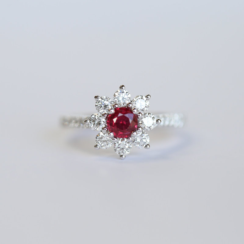 American Jewelry 18K White Gold .59ct Ruby & .86ctw Diamond Flower Halo Ring (Size 7)