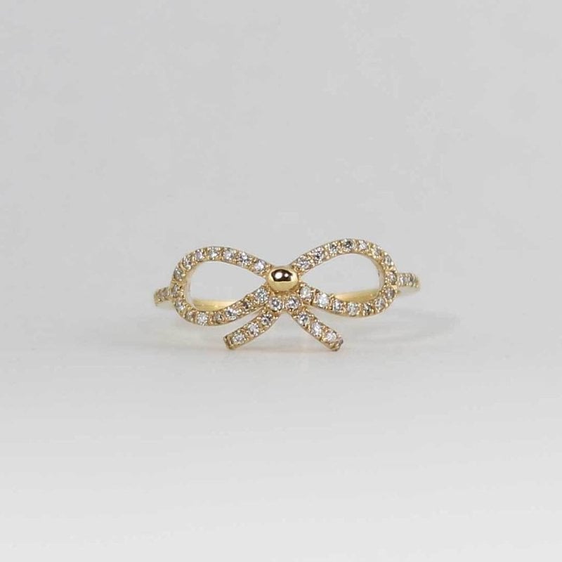 American Jewelry 14k Yellow Gold .22ctw Diamond Bow Ladies Ring (Size 6.5)