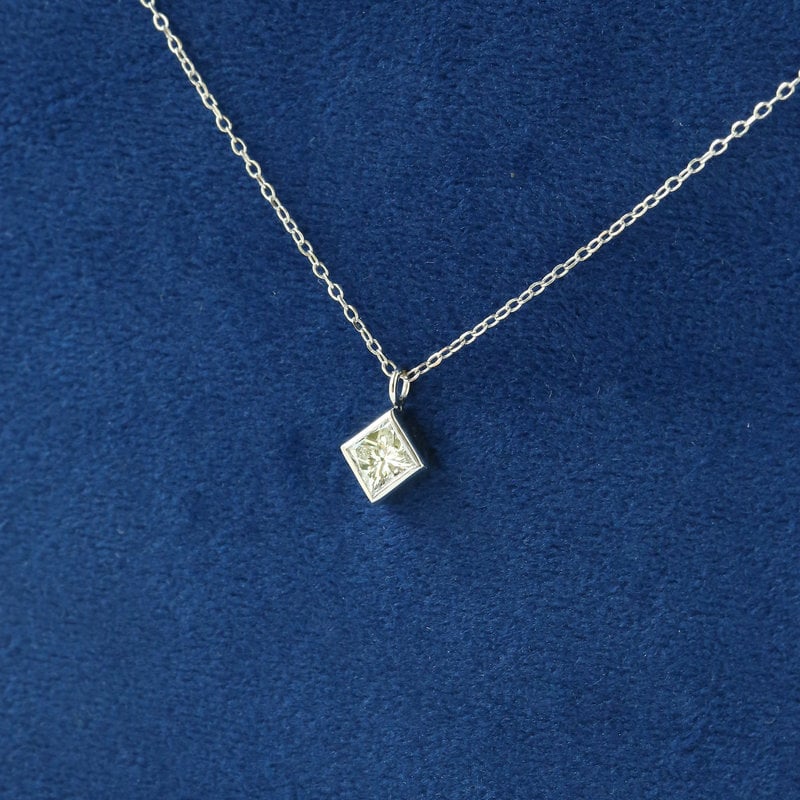 American Jewelry 14K White Gold 1/2ctw Diamond Bezel Set Princess Cut Solitaire Necklace (18")