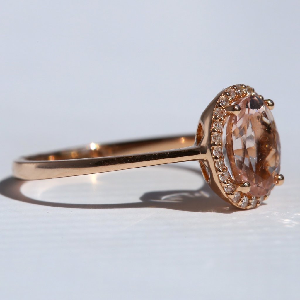 American Jewelry 14k Rose Gold .10ctw Round Brilliant Diamond & Oval  Morganite Halo Ring (Size 7)