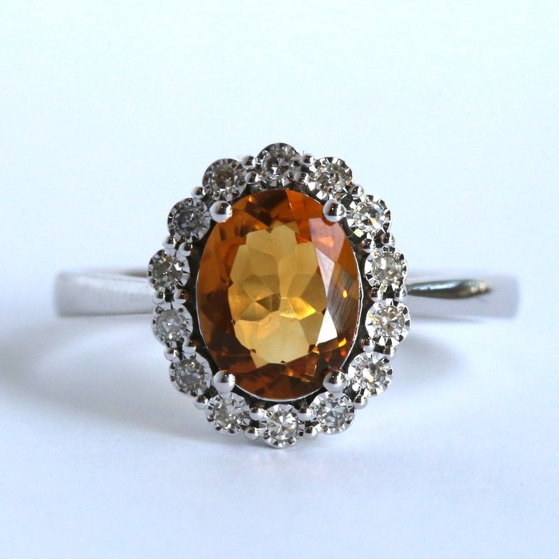 American Jewelry 14k White Gold .16ctw Round Brilliant Diamond Oval Citrine Halo Ring (Size 7)