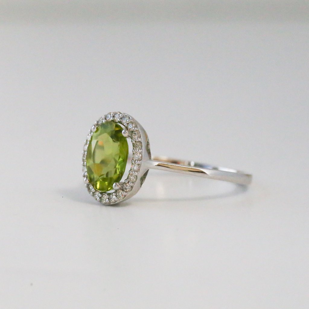 14k White Gold .20ctw Diamond and 1.93ct Peridot Halo Ring (size 7)