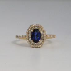 14k Yellow Gold .48ctw Diamond and 1.00ctw Sapphire Halo Ring (size 7)