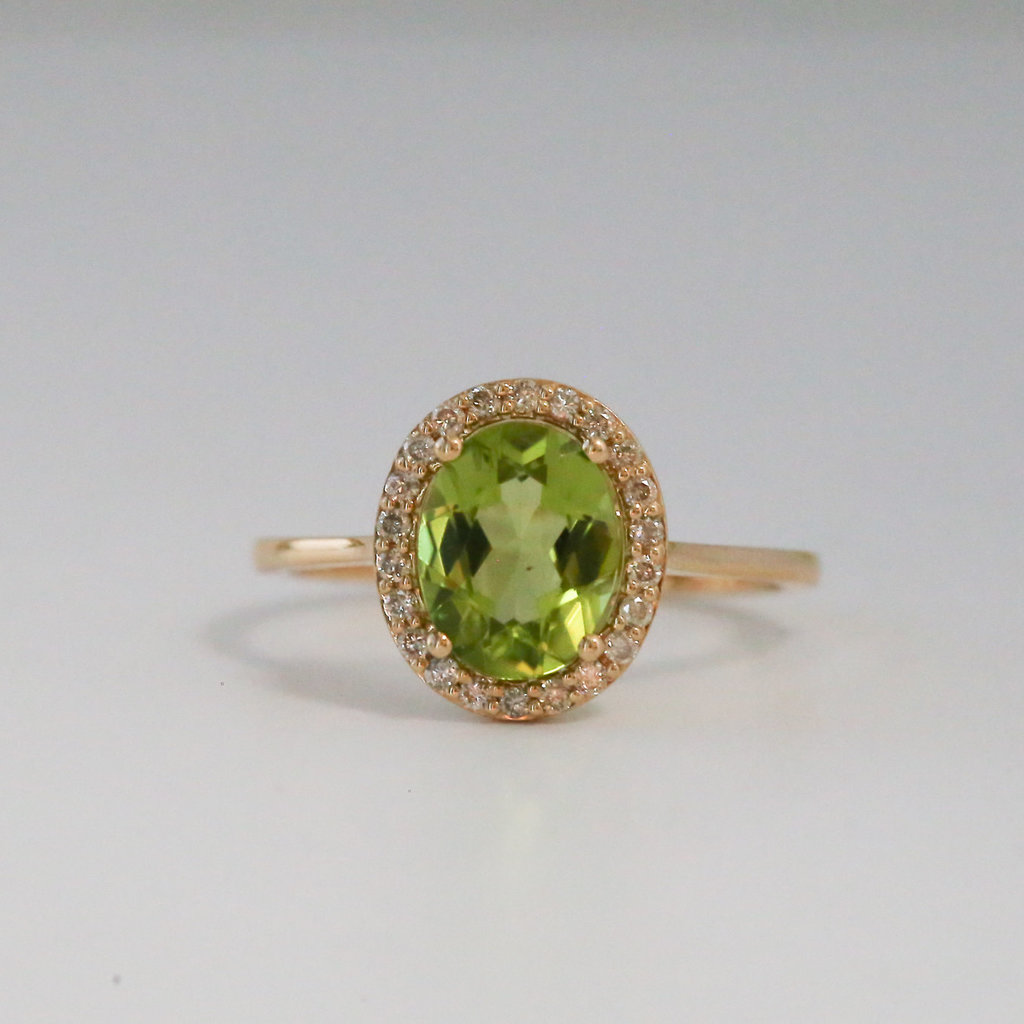 American Jewelry 14k Yellow Gold .20ctw Diamond and 1.93ctw Peridot Halo Ring (size 7)