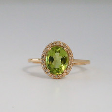 14k Yellow Gold .20ctw Diamond and 1.93ctw Peridot Halo Ring (size 7)