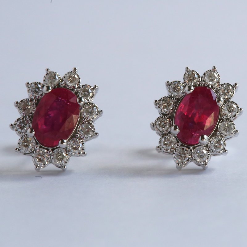 American Jewelry 14k White Gold .25ctw Round Brilliant Diamond 1.37ctw Oval Ruby Halo Stud Earrings